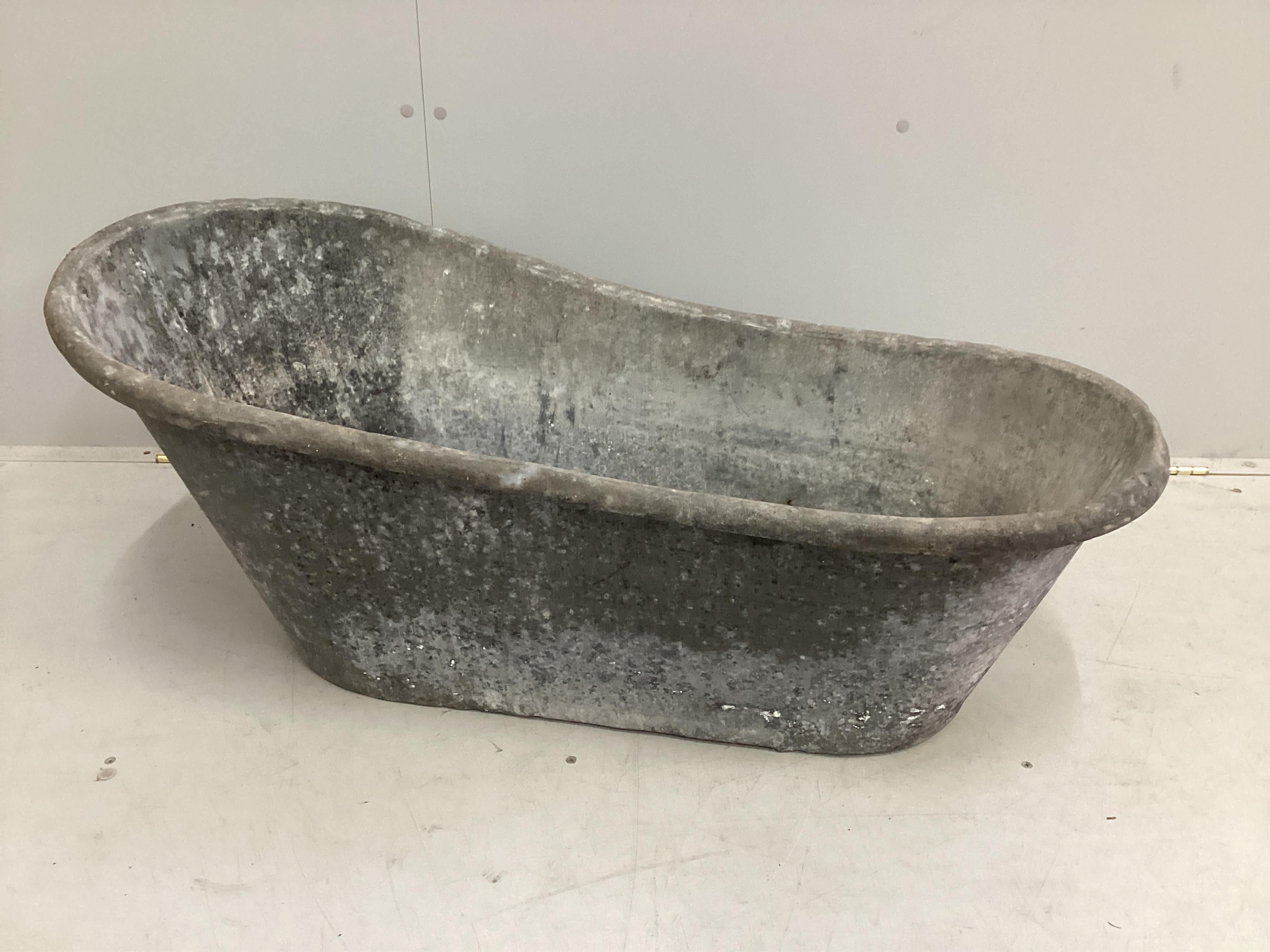 A vintage galvanised child’s bath, length 102cm, height 42cm. Condition - fair